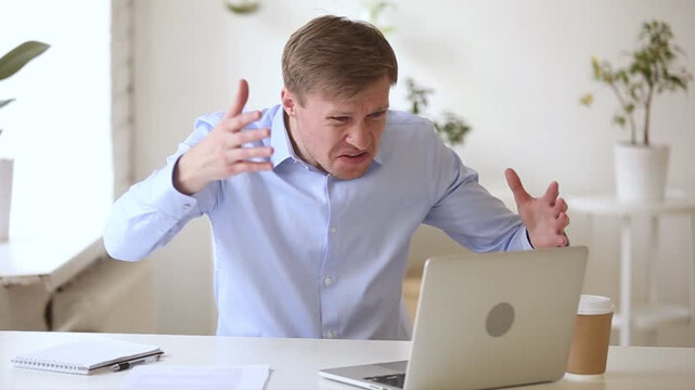 Man Gets Mad At Laptop