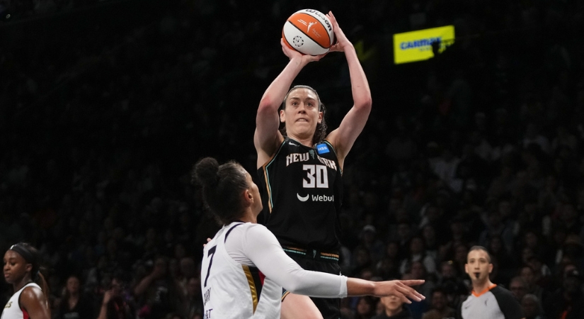 Photo of Brenna Stewart shooting against Las Vegas Aces' on October 23rd, 2023.