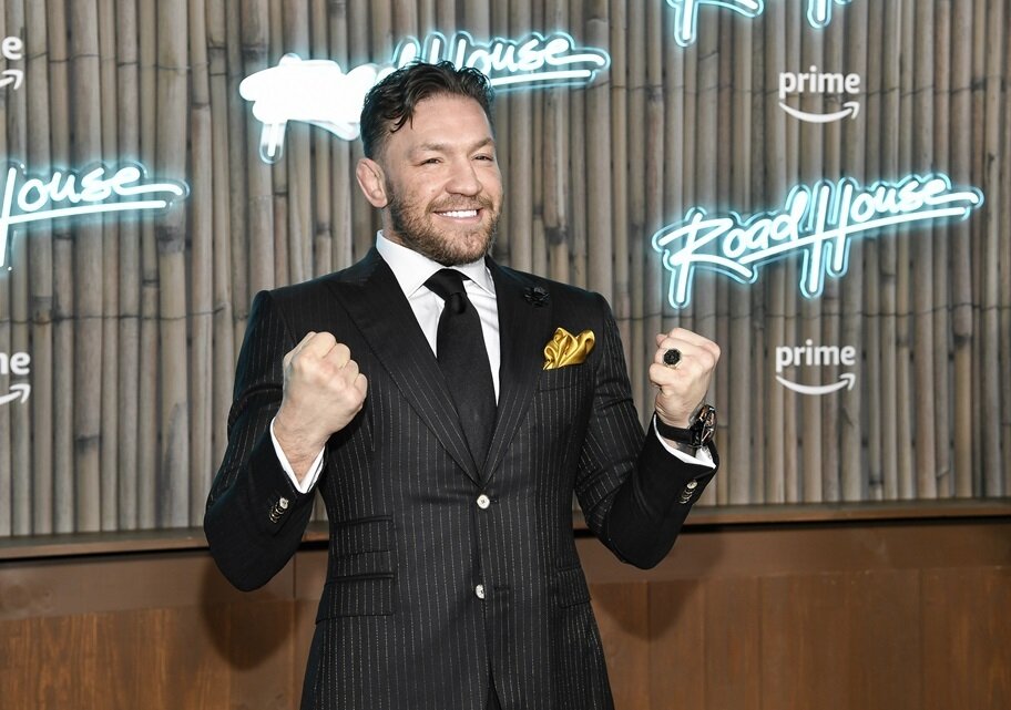 Conor McGregor poses at Road House premiere