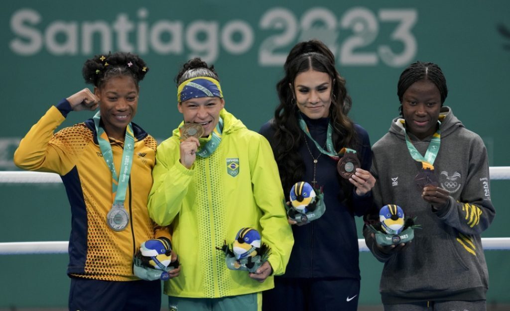 Jajaira Gonzalez holding her bronze medal at the 2023 Pan American Games.