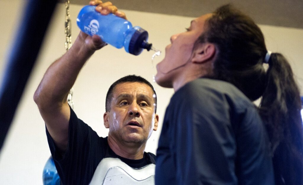 Jajaira Gonzalez training with her father and coach, Jose Gonzalez.