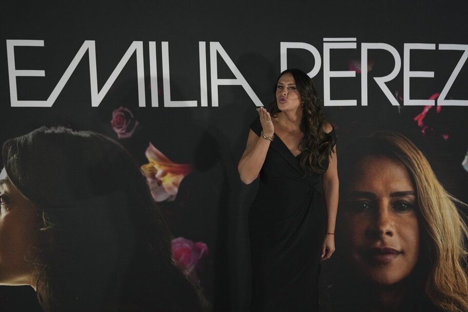 Karla Sofia Gascon blows a kiss while promoting "Emilia Perez".