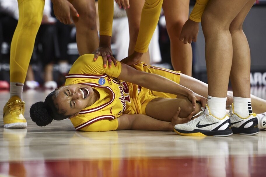 USC's Juju Watkins reacts after tearing her ACL.