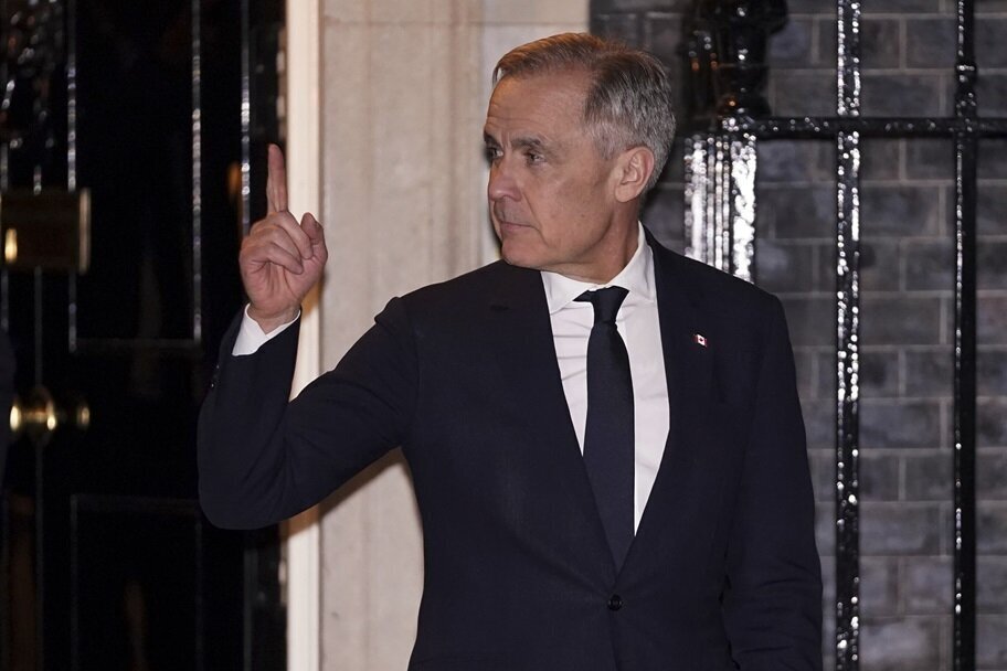 Canadian Prime Minister Mark Carney leaves a meeting with British PM Keir Starmer.