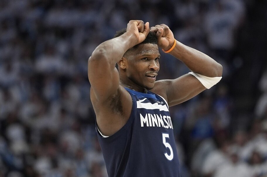 Anthony Edwards gestures during an NBA game.