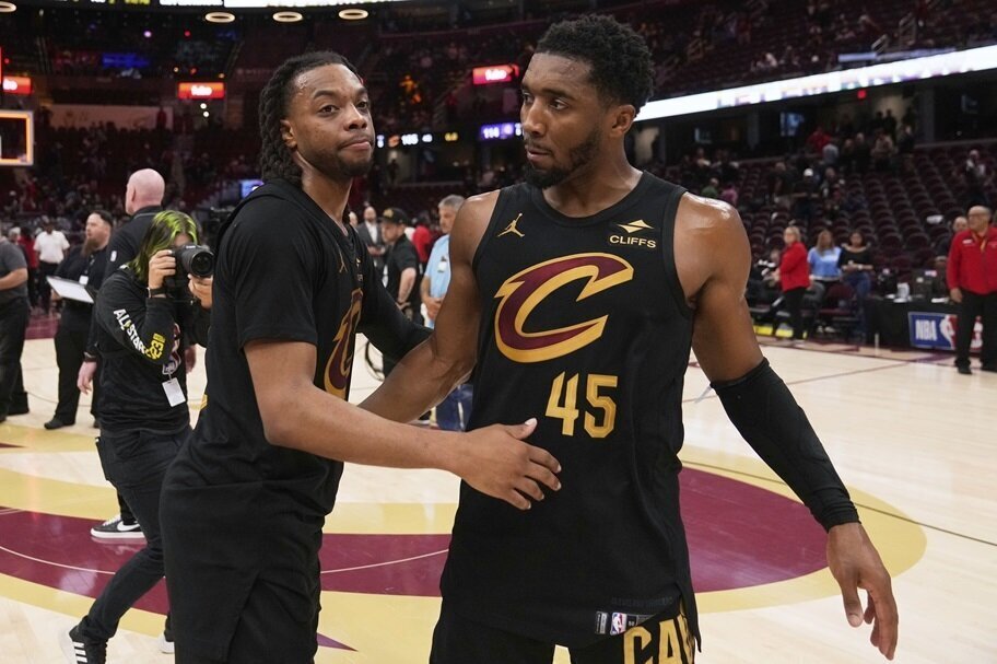 Donovan Mitchell and Darius Garland leave the court after losing in the playoffs.