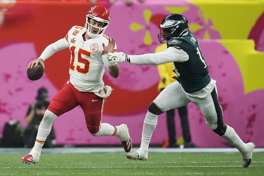 Patrick Mahomes runs from Josh Sweat during Super Bowl 59