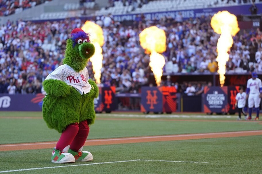 The Phillie Phanatic performs for the crowd at an MLB game.