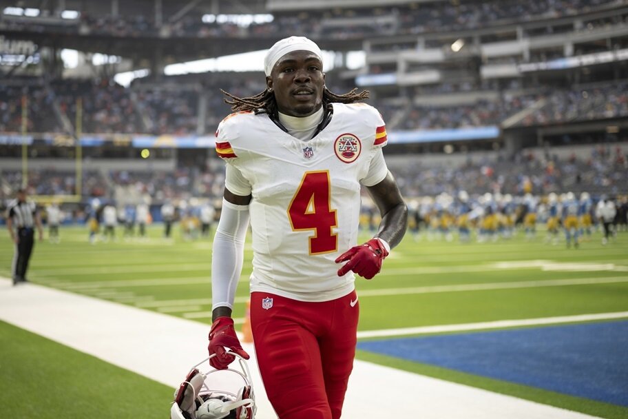 Rashee Rice jogs off the field during an NFL game.