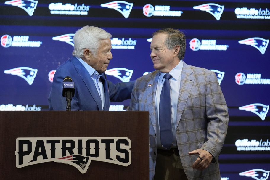 Robert Kraft and Bill Belichick shake hands at Belichick's exit press conference.