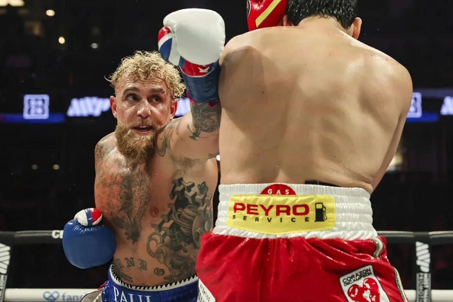 Jake Paul throws a punch at Julio Cesar Chavez Jr.