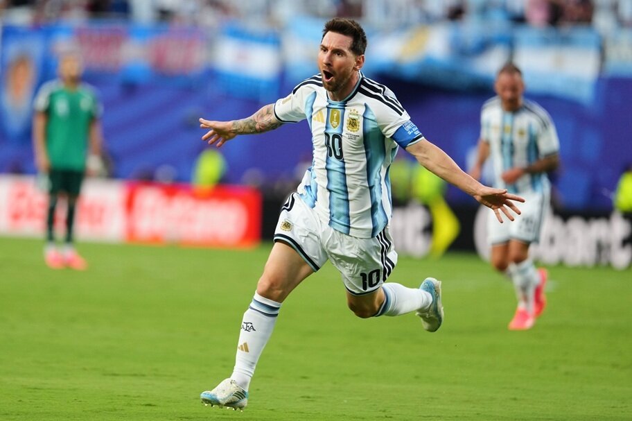 Lionel Messi celebrates a goal against Algeria.